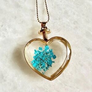 Bright blue pressed flower heart crystal cut necklace